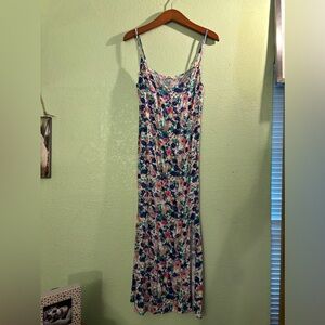 Cute midi slip dress with slit on the side. Like new, never been worn sz S.
